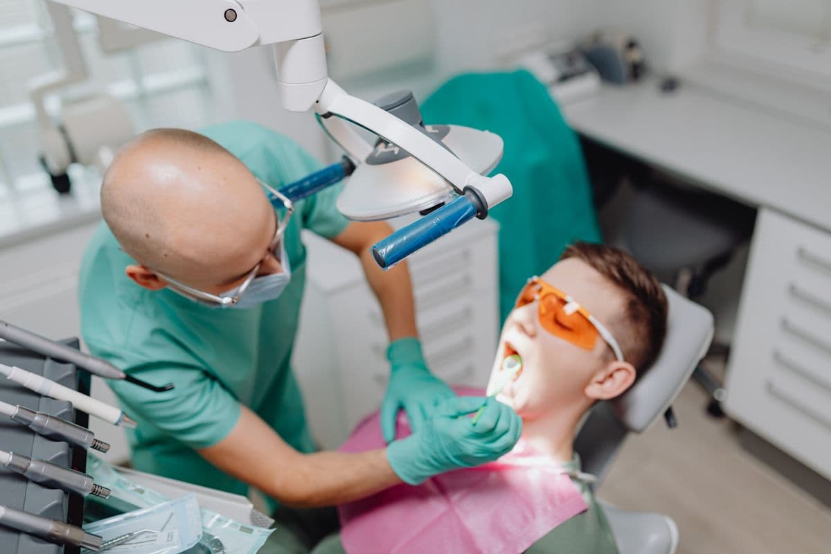 Dentist performing an intraoral scan during an impression-free denture workflow