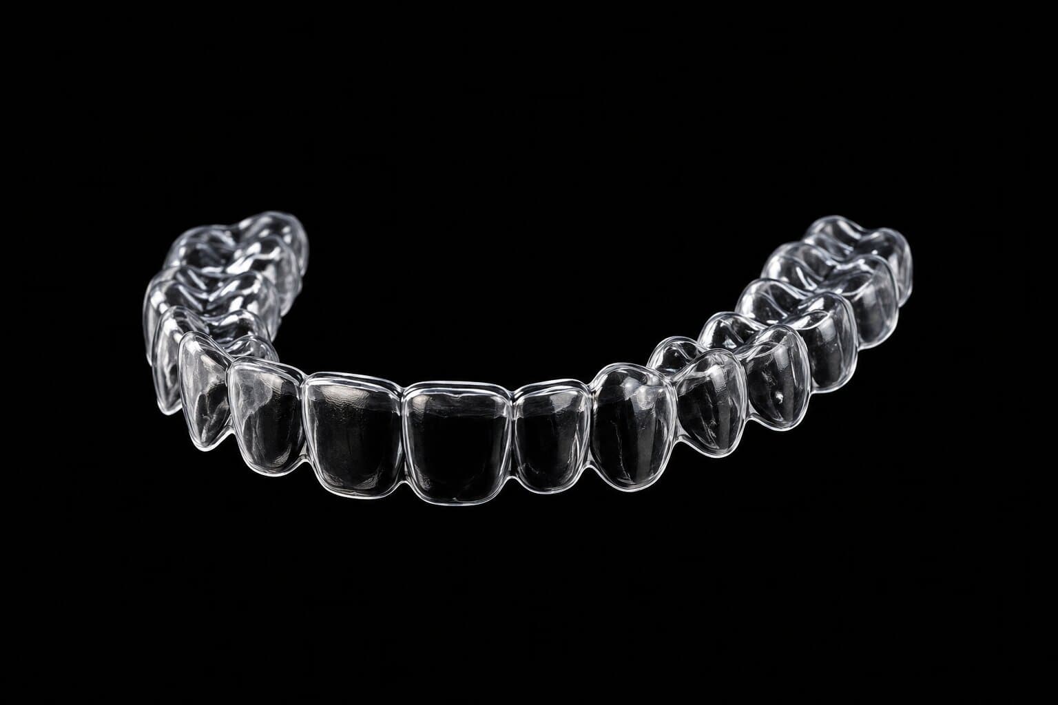 Clear aligner treatment planning displayed on a digital orthodontic workstation
